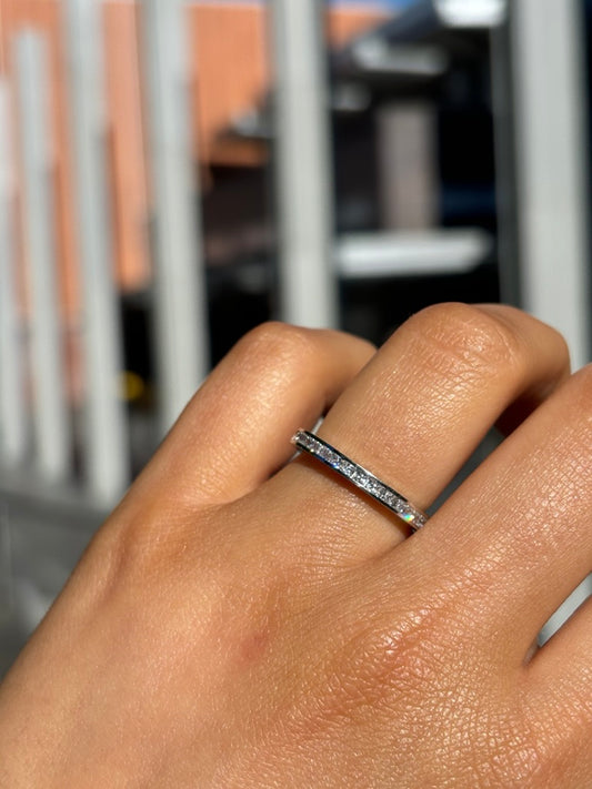 Avery- Princess Cut nestled in a channel setting - Prime & Pure