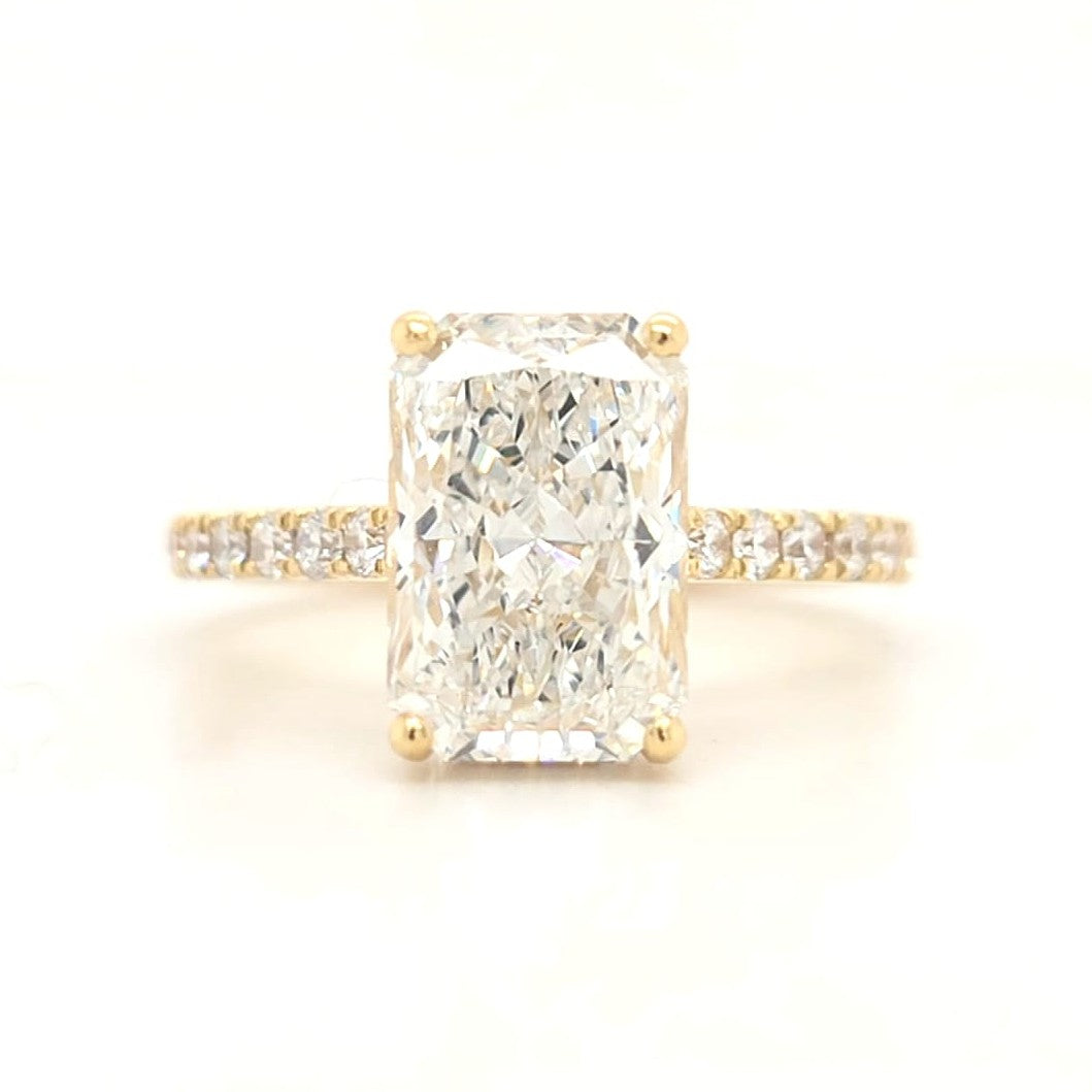Hallie – Radiant Solitaire with Hidden Halo and Pavé Cathedral Style Band