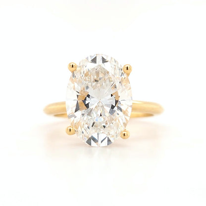 4.2ct - D VS1 Oval Lab Grown Diamond with hidden halo and a plain band Size J