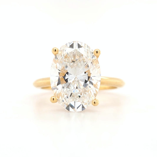 4.2ct - D VS1 Oval Lab Grown Diamond with hidden halo and a plain band Size J