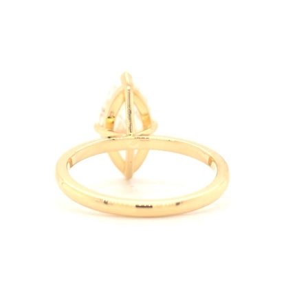 Remi – Marquise solitaire ring with opposite-facing V prongs and round prongs