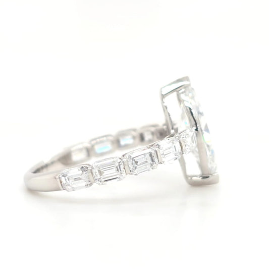 Londyn – Marquise Solitaire with emerald accent band