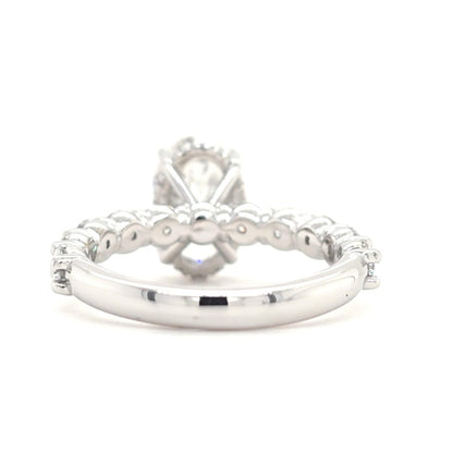 Maggie – Oval Solitaire with Hidden Halo and Round Accents band