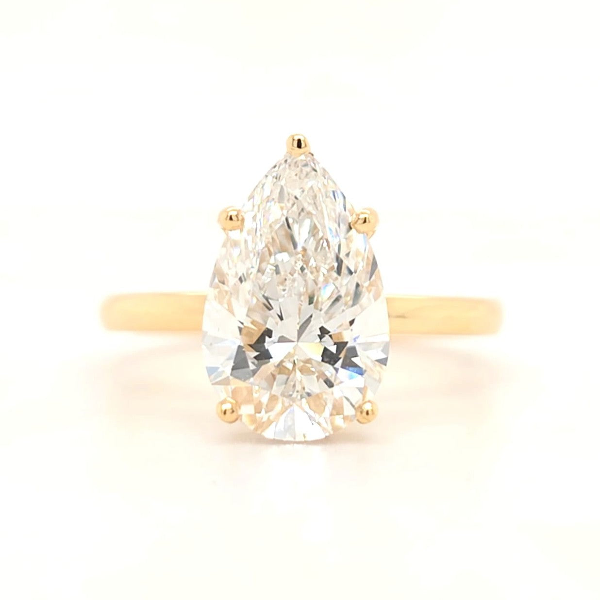 Kali – Pear Solitaire with Hidden Halo and Plain Band