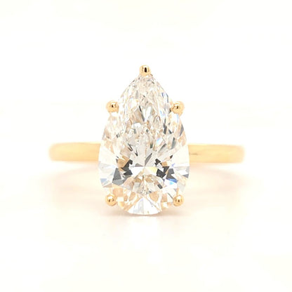 Kali – Pear Solitaire with Hidden Halo and Plain Band