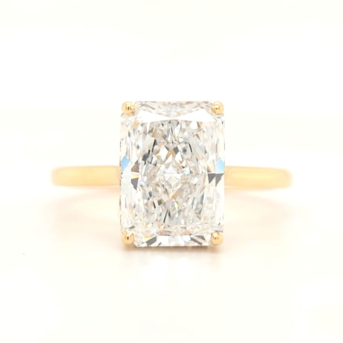 Nova – Radiant Solitaire with Hidden Halo Plain Band