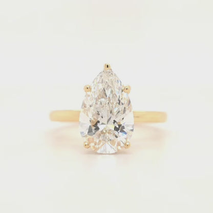 Kali – Pear Solitaire with Hidden Halo and Plain Band